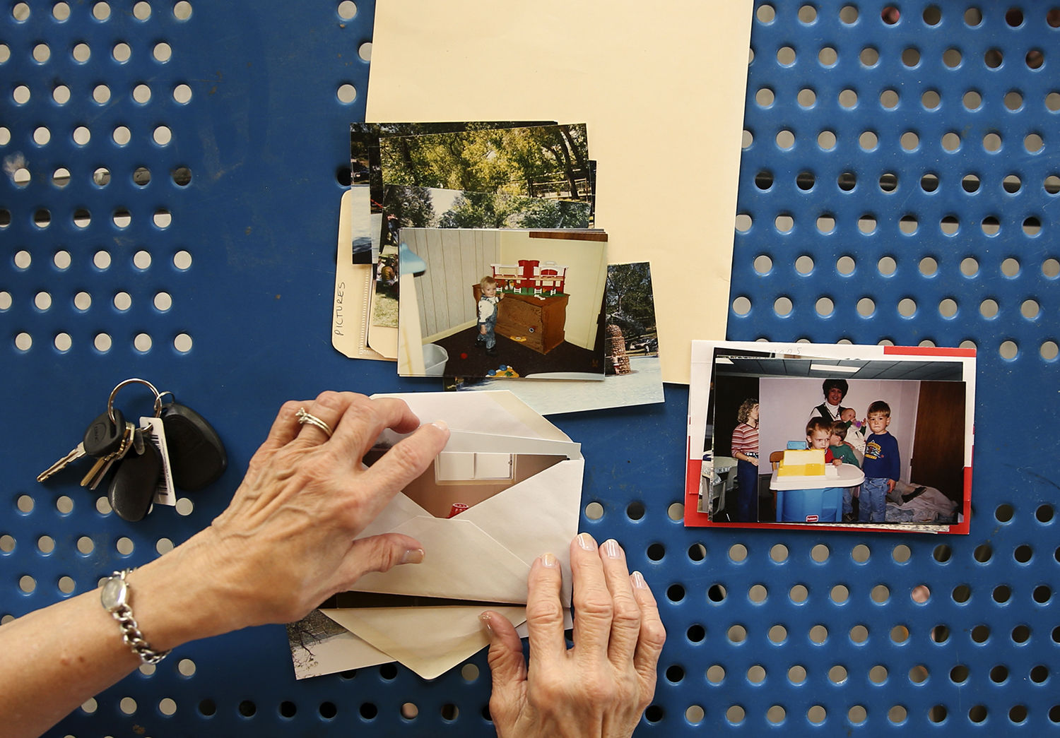 Several MOBs mentor moms looked through old photos from their years